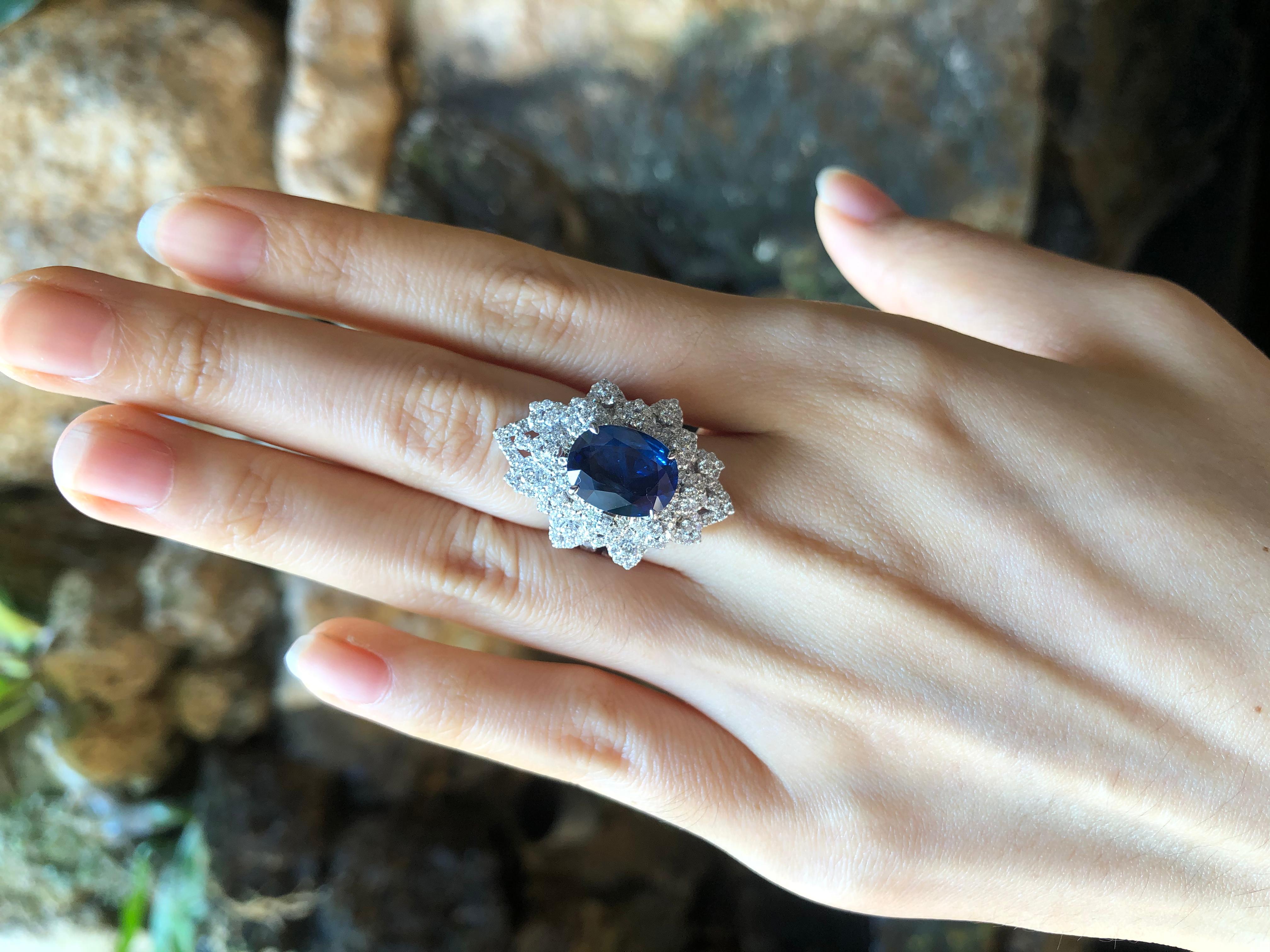 Edwardian Blue Sapphire with Diamond Ring Set in 18 Karat White Gold Settings For Sale