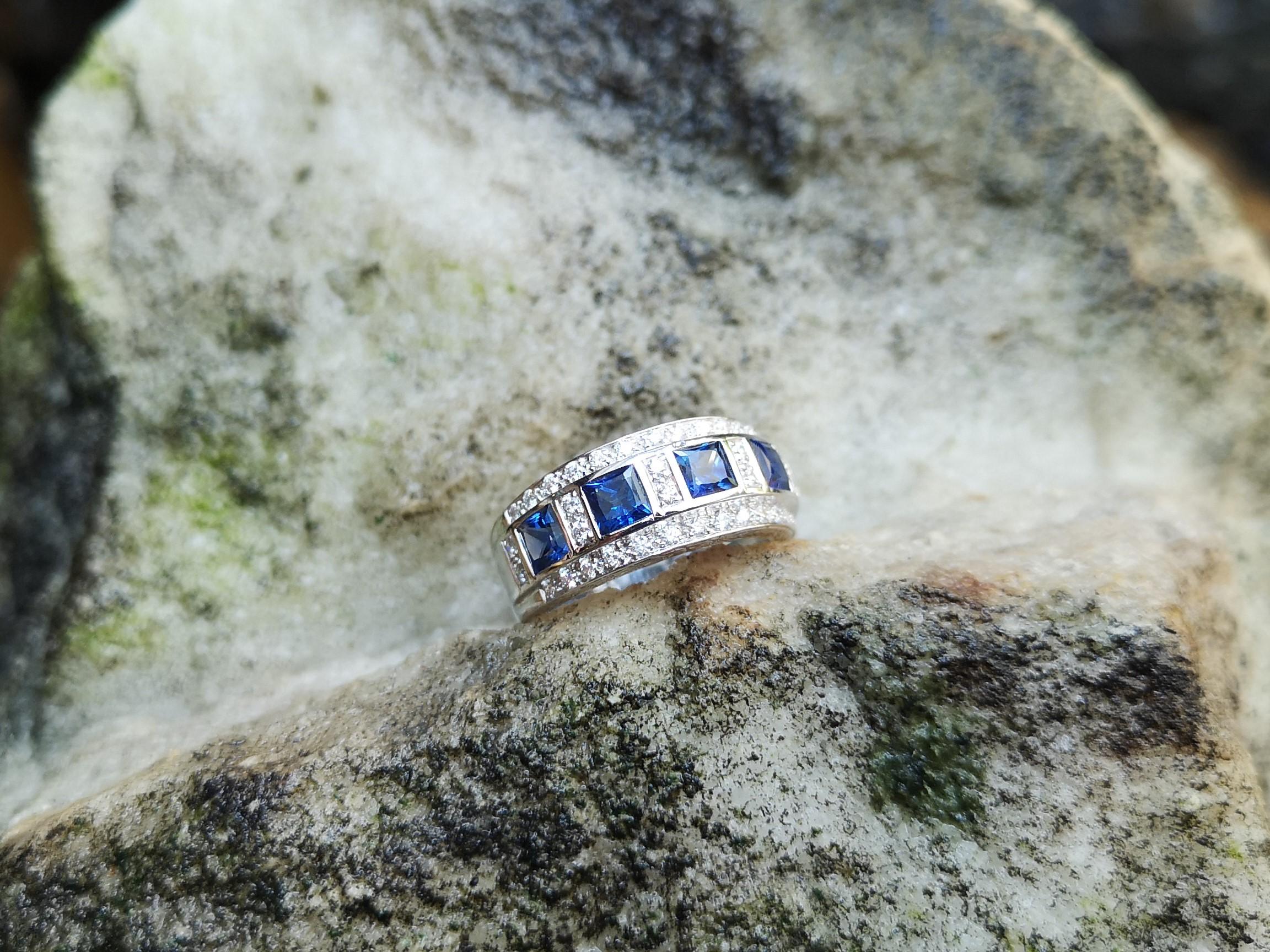 Modern Blue Sapphire with Diamond Ring Set in 18 Karat White Gold Settings For Sale
