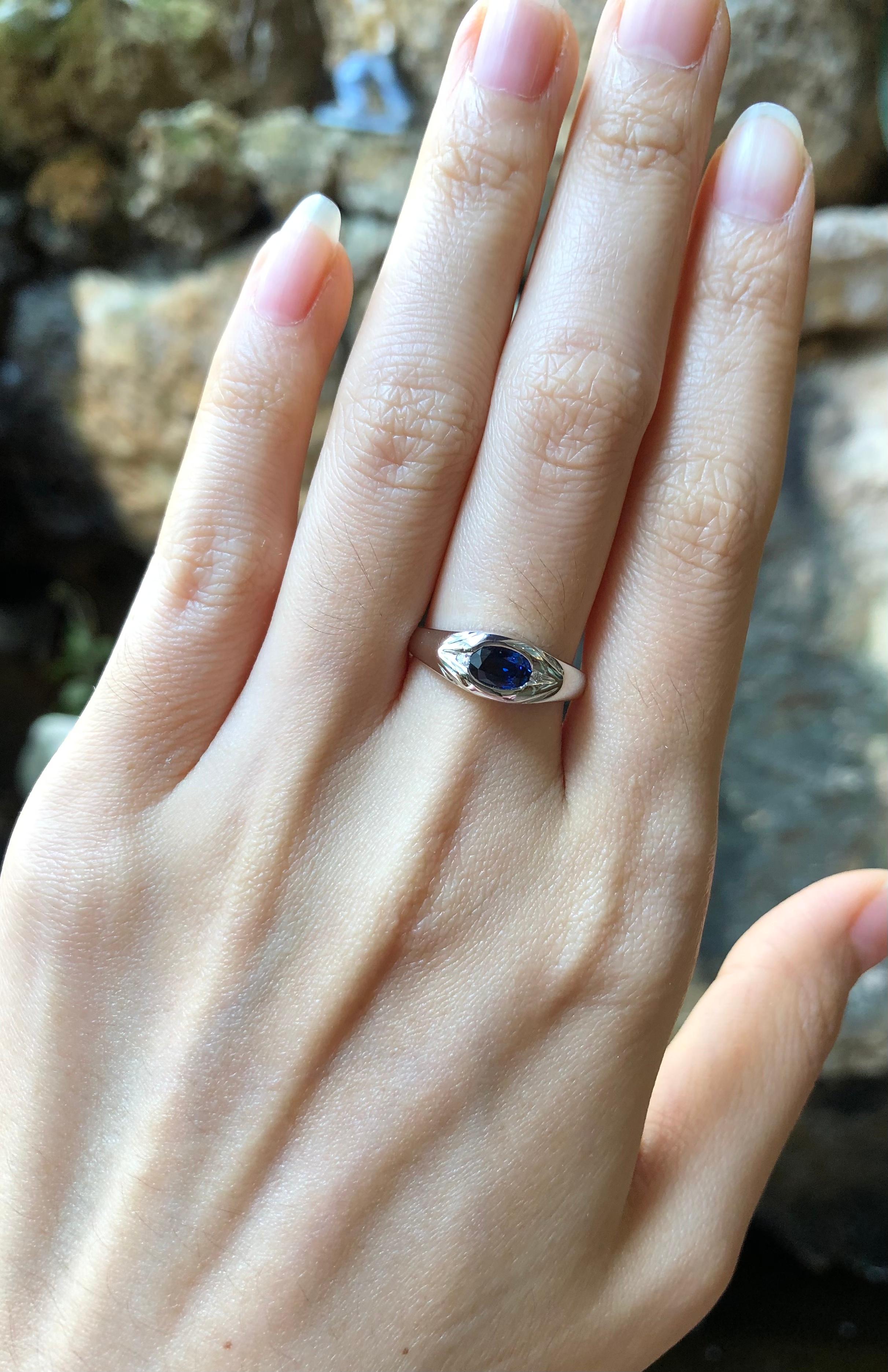 Contemporary Blue Sapphire with Diamond Ring Set in 18 Karat White Gold Settings For Sale