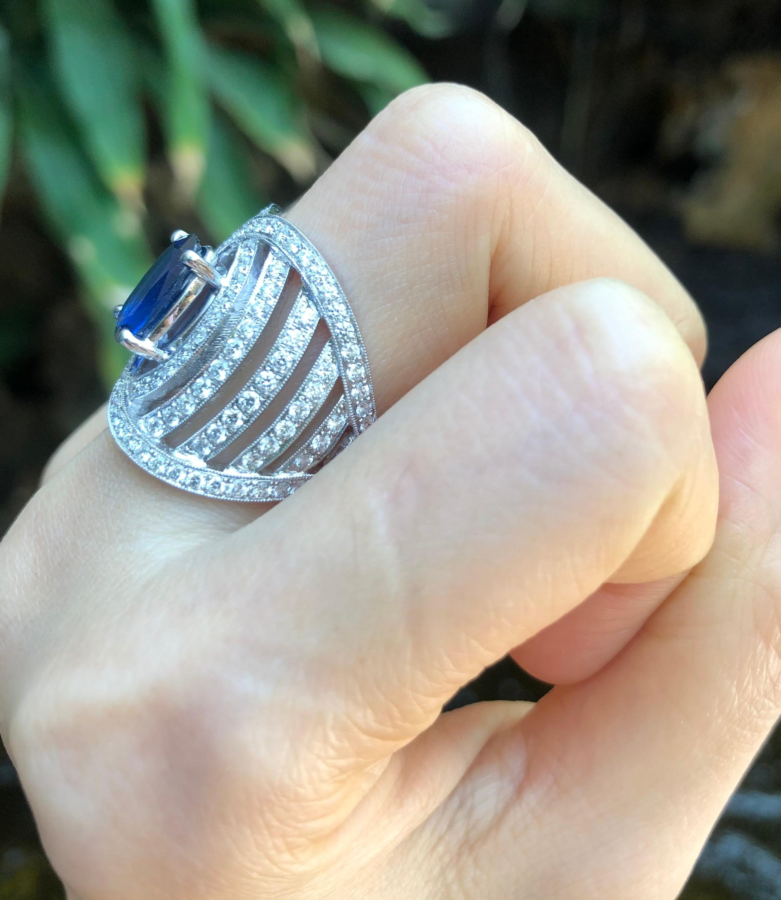 Contemporary Blue Sapphire with Diamond Ring Set in 18 Karat White Gold Settings For Sale