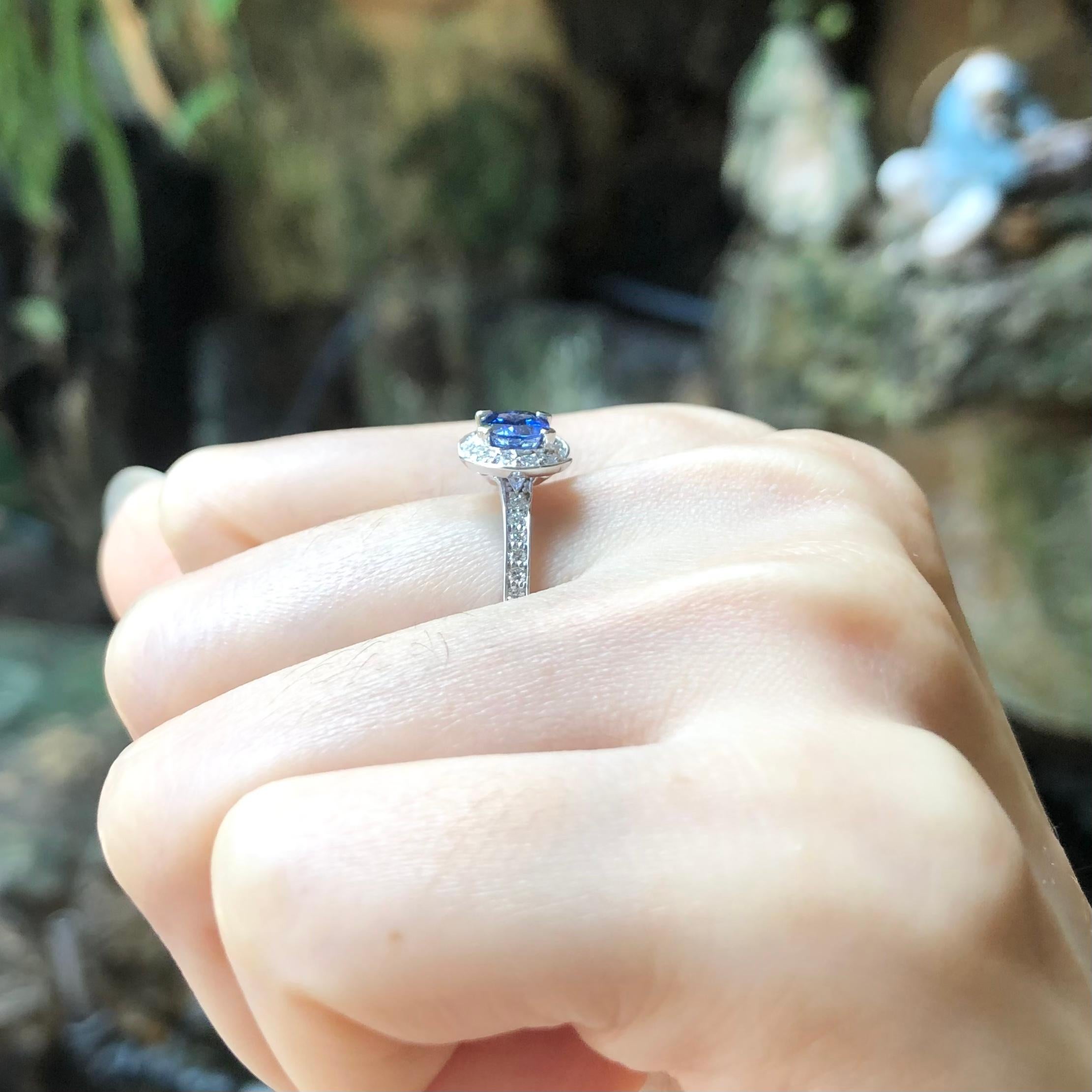Contemporary Blue Sapphire with Diamond Ring set in 18 Karat White Gold Settings For Sale