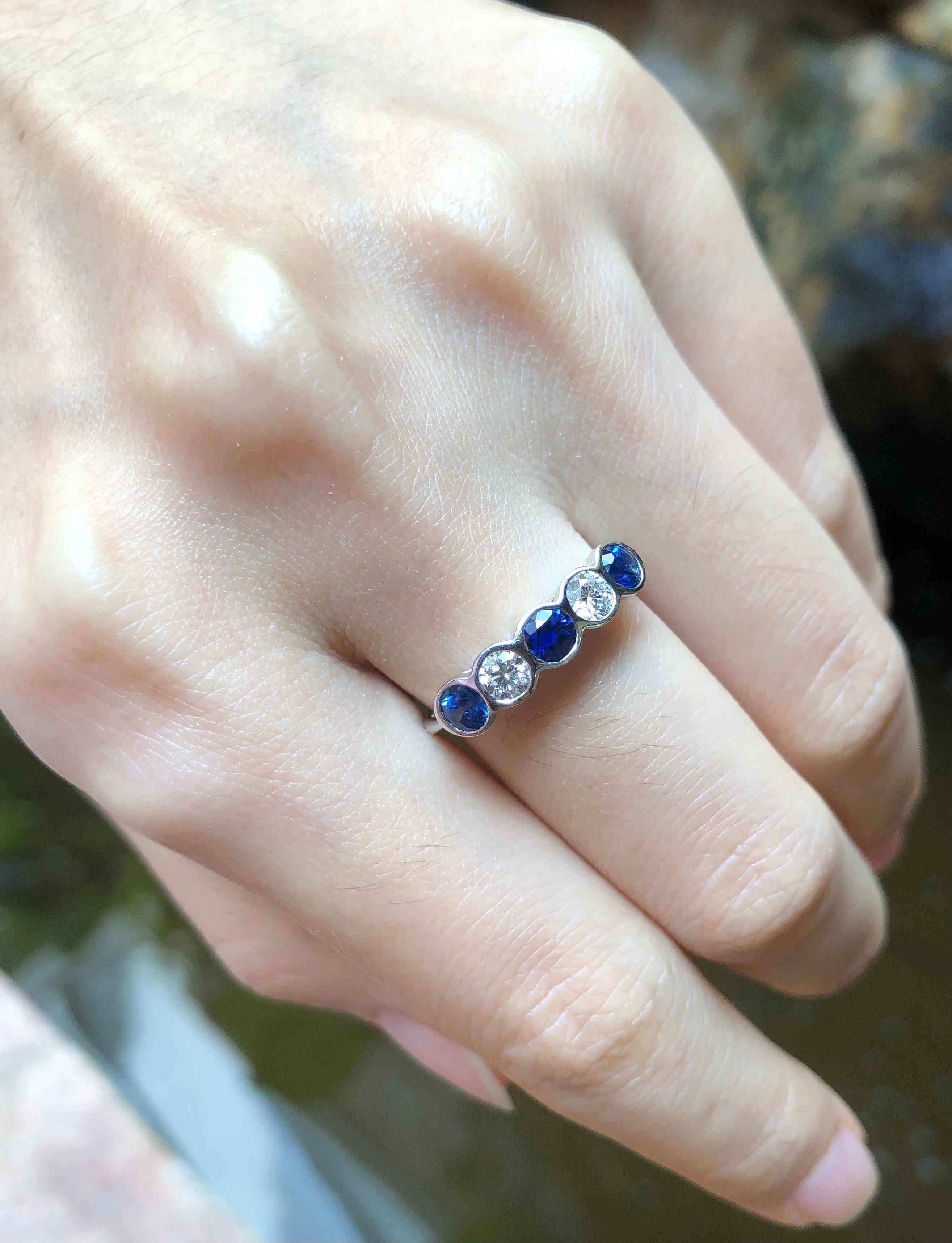 Round Cut Blue Sapphire with Diamond Ring Set in 18 Karat White Gold Settings For Sale