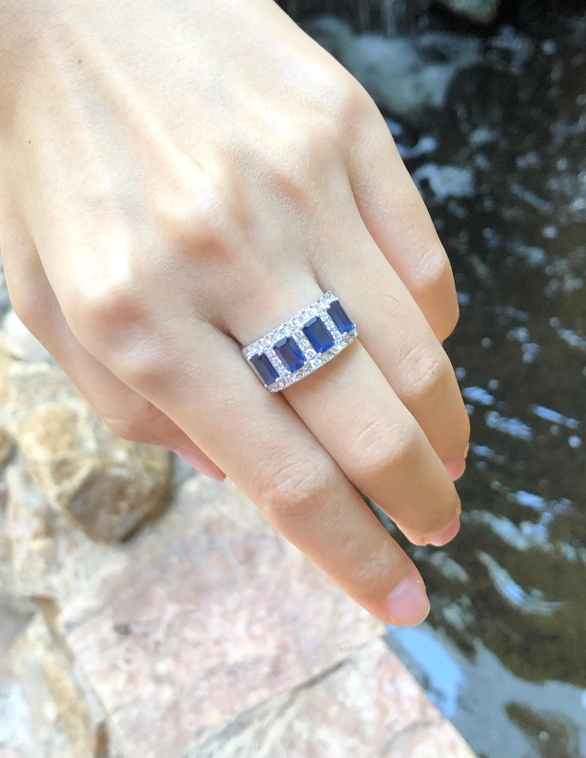 Contemporary Blue Sapphire with Diamond Ring Set in 18 Karat White Gold Settings For Sale