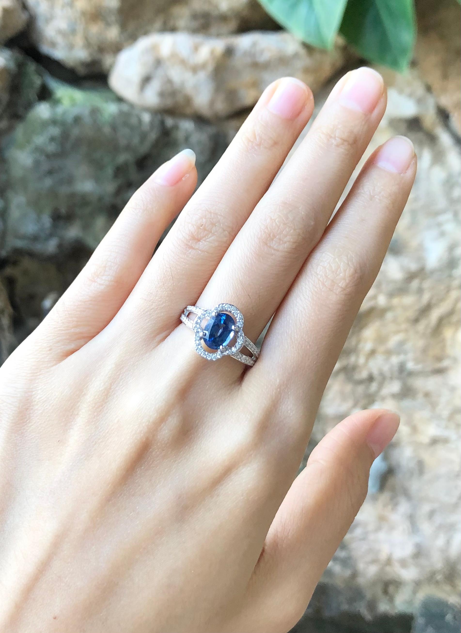 blue sparkling crown solitaire ring