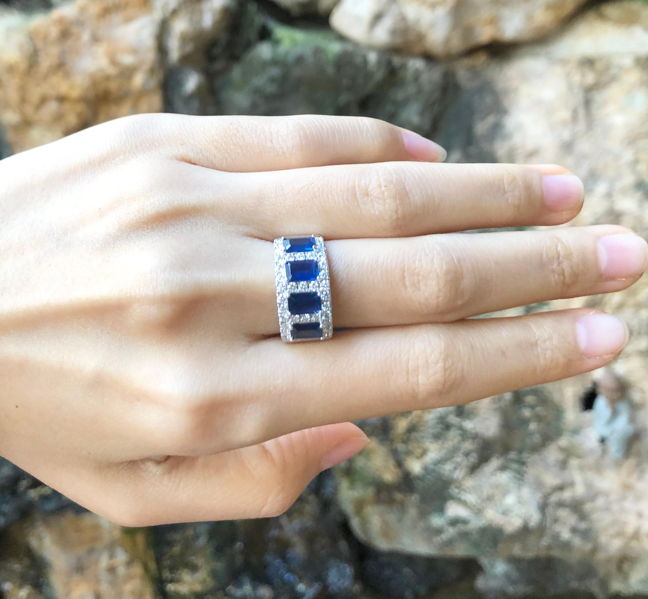 Emerald Cut Blue Sapphire with Diamond Ring Set in 18 Karat White Gold Settings For Sale