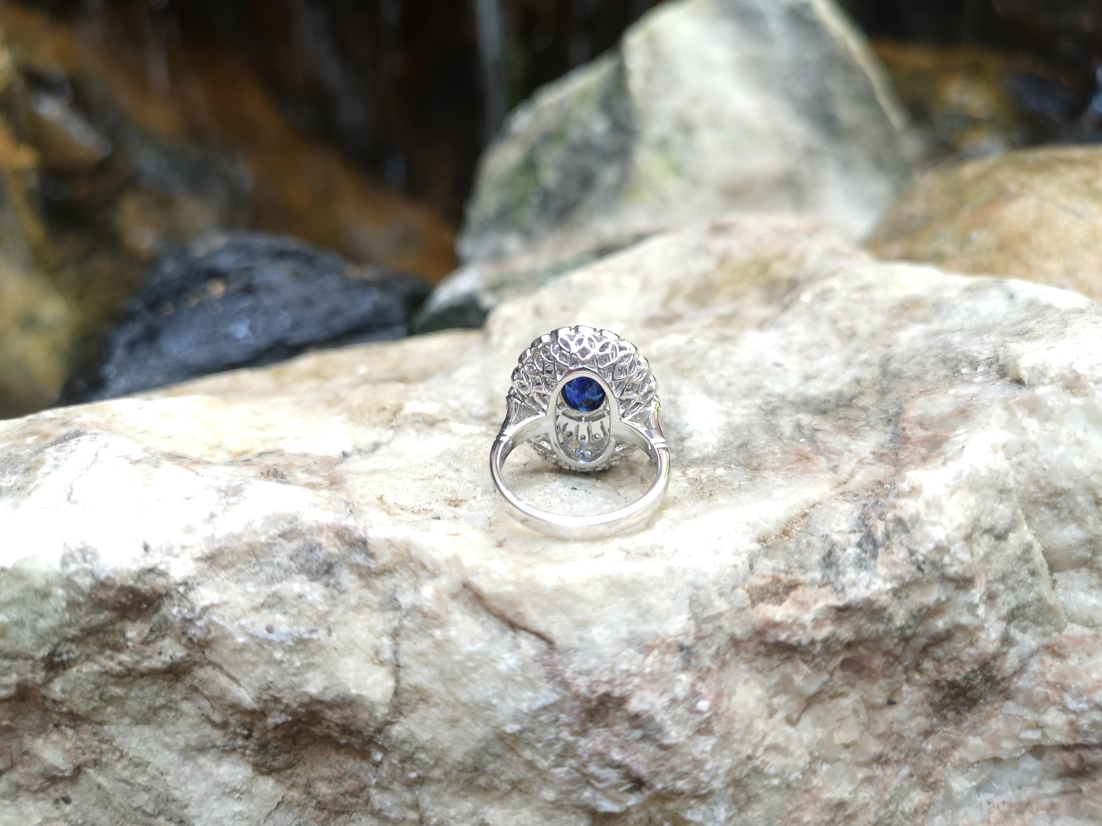 Oval Cut Blue Sapphire with Diamond Ring Set in 18 Karat White Gold Settings For Sale
