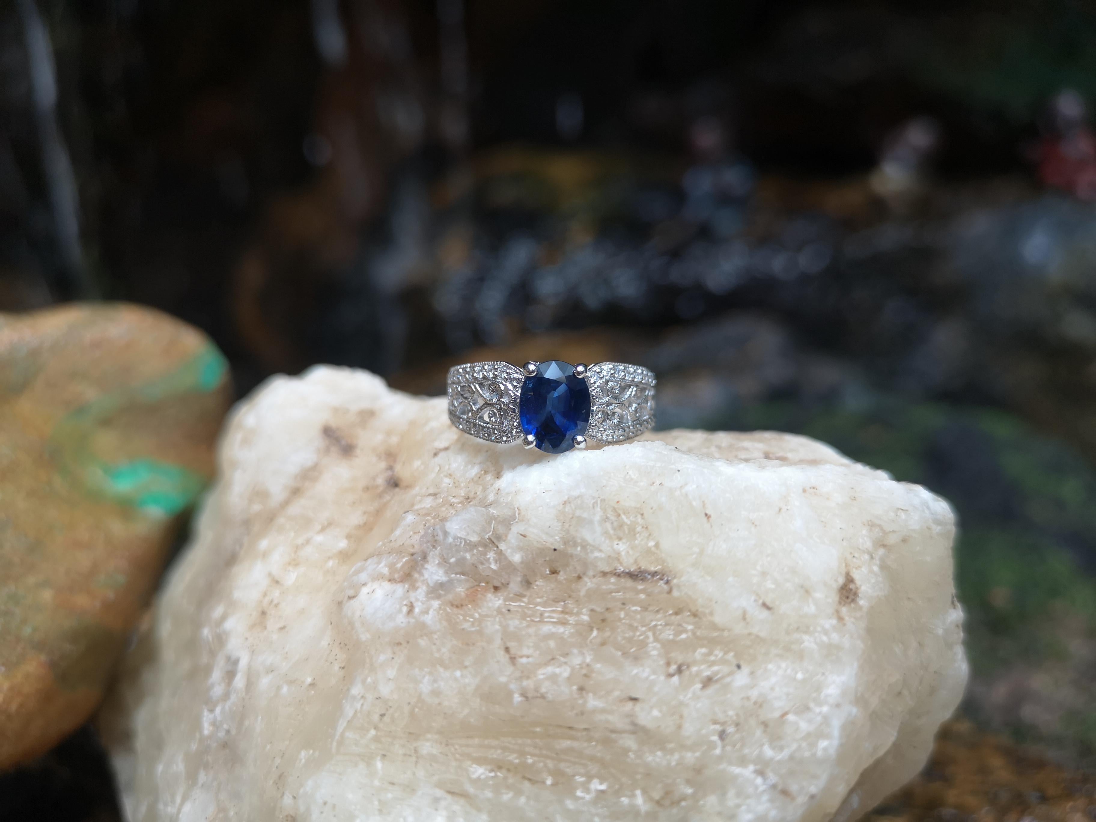 Oval Cut Blue Sapphire with Diamond Ring Set in 18 Karat White Gold Settings For Sale