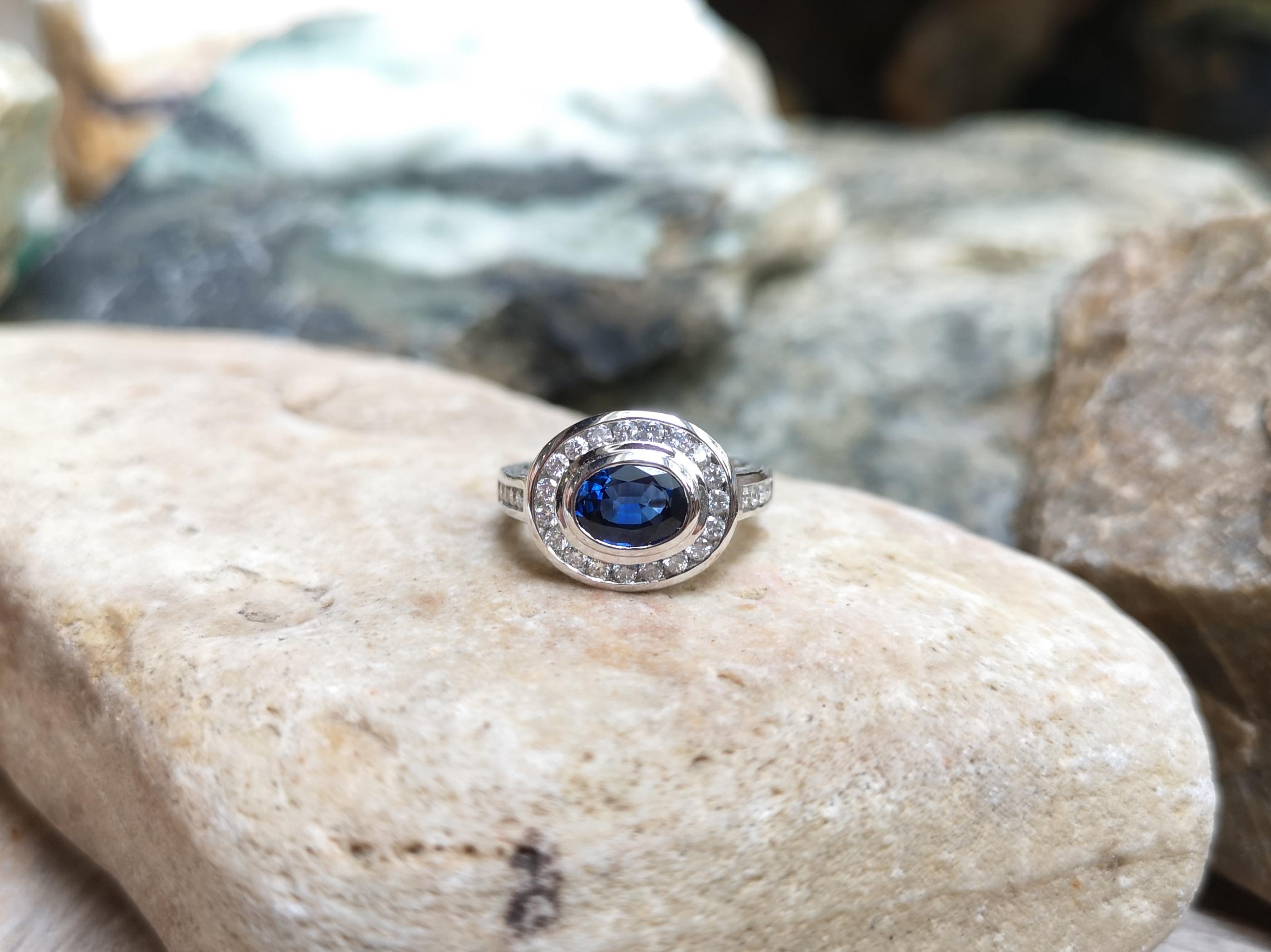 Women's Blue Sapphire with Diamond Ring Set in 18 Karat White Gold Settings For Sale