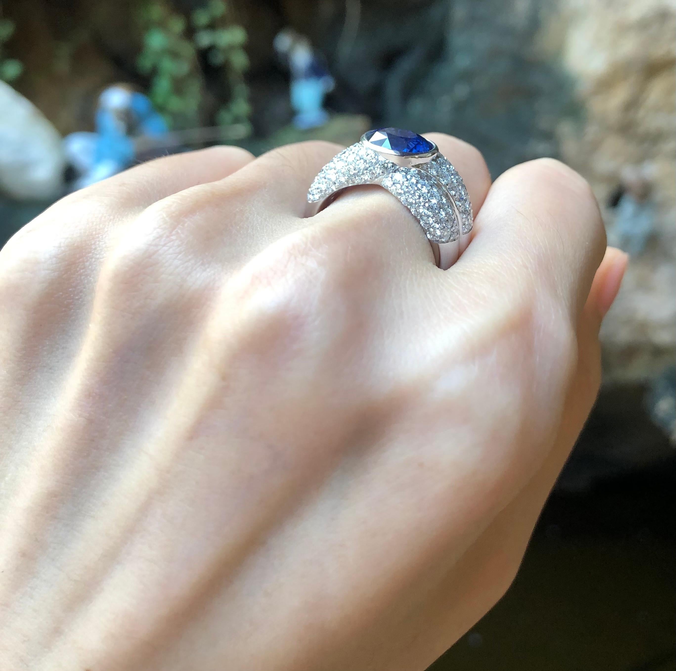 Women's or Men's Blue Sapphire with Diamond Ring Set in 18 Karat White Gold Settings For Sale