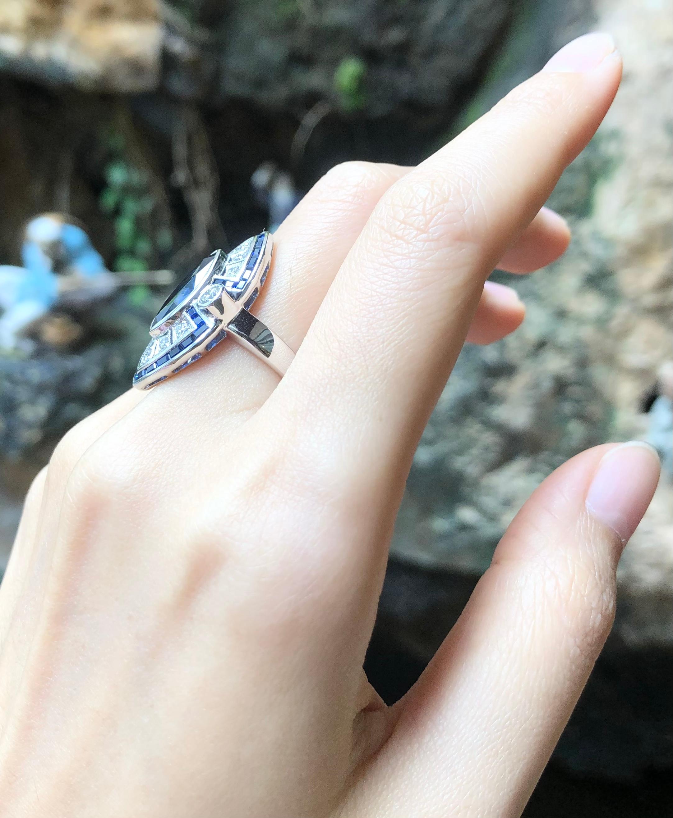 Women's Blue Sapphire with Diamond Ring Set in 18 Karat White Gold Settings For Sale