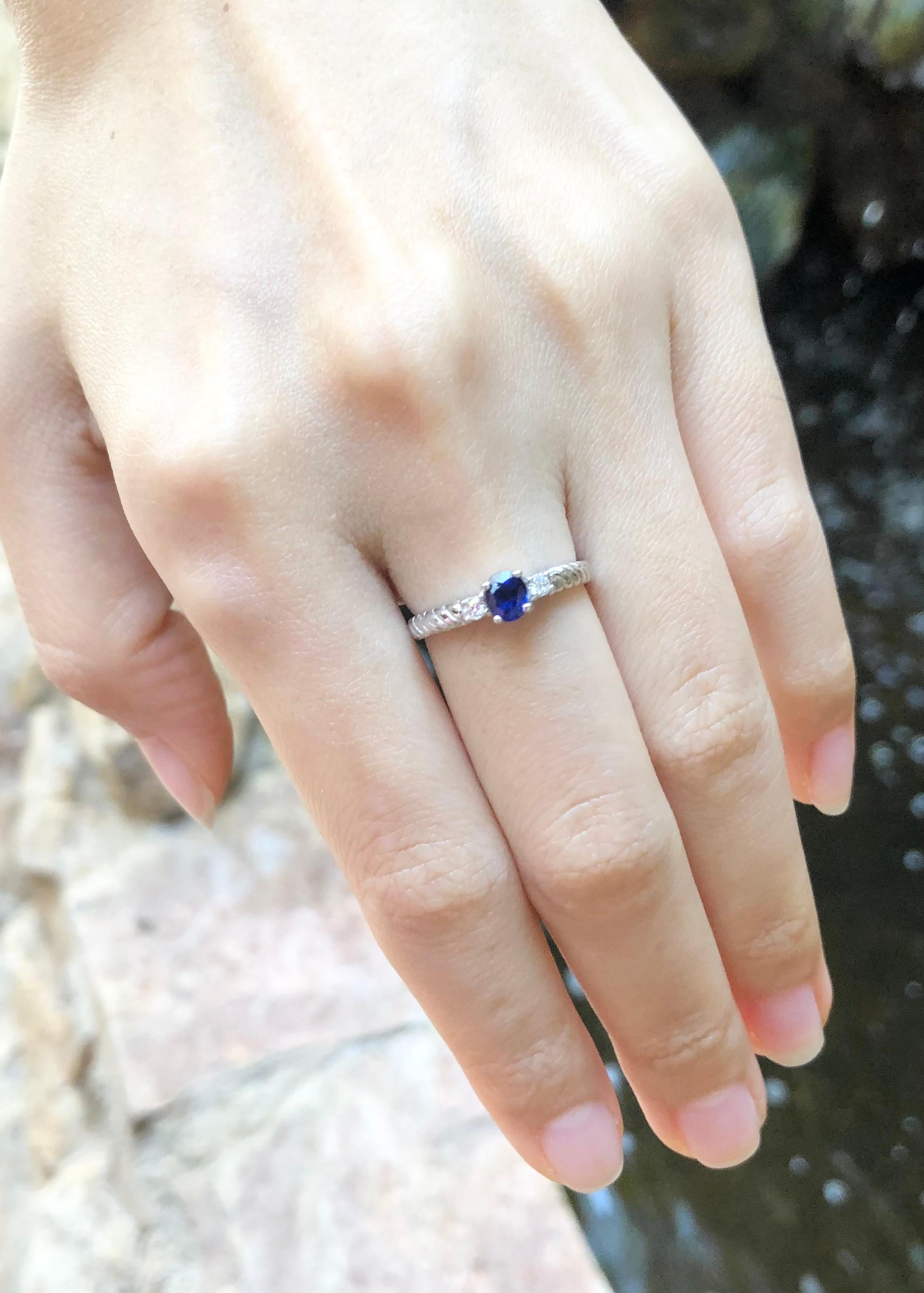 Women's Blue Sapphire with Diamond Ring set in 18 Karat White Gold Settings For Sale