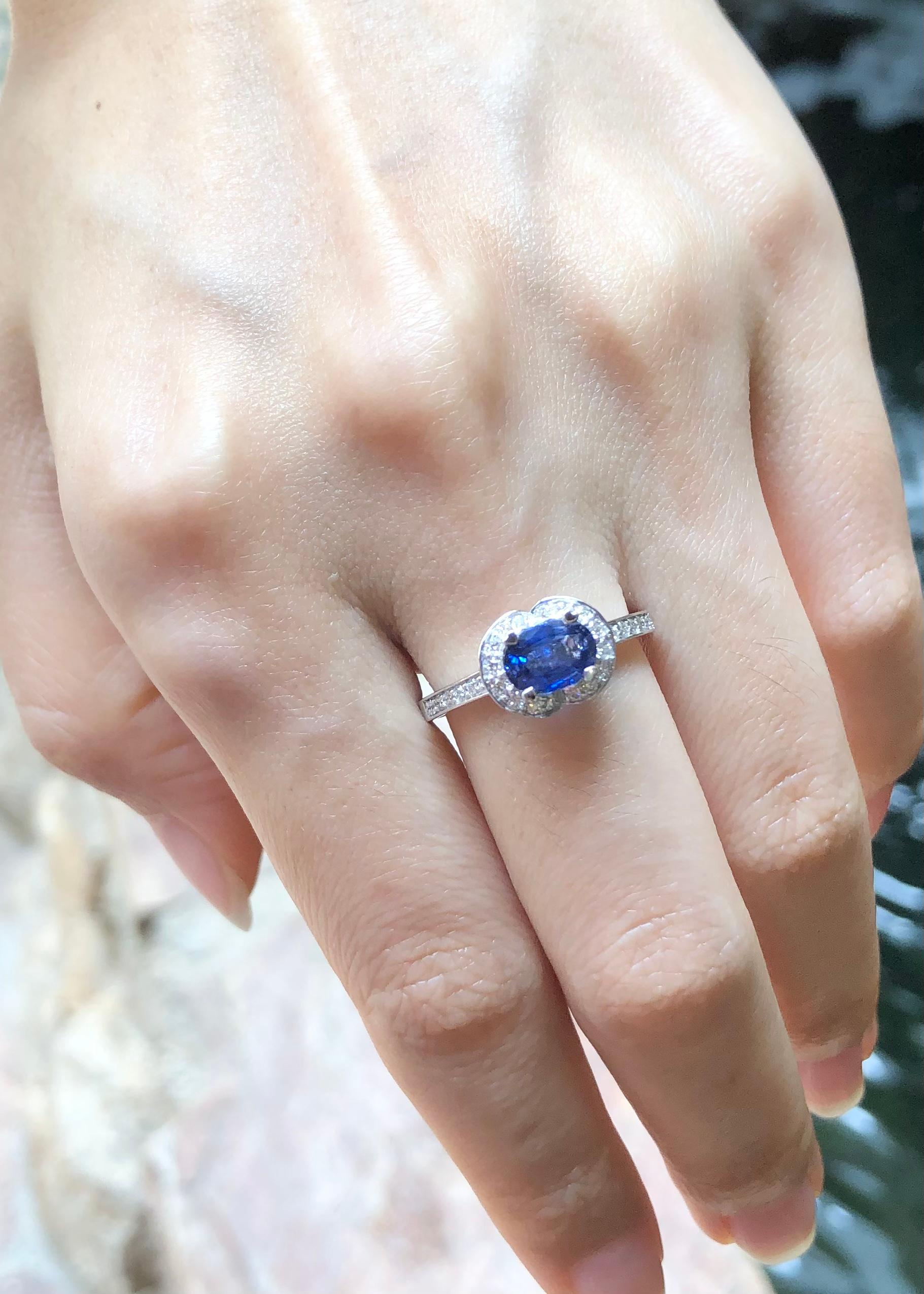 Women's Blue Sapphire with Diamond Ring set in 18 Karat White Gold Settings For Sale