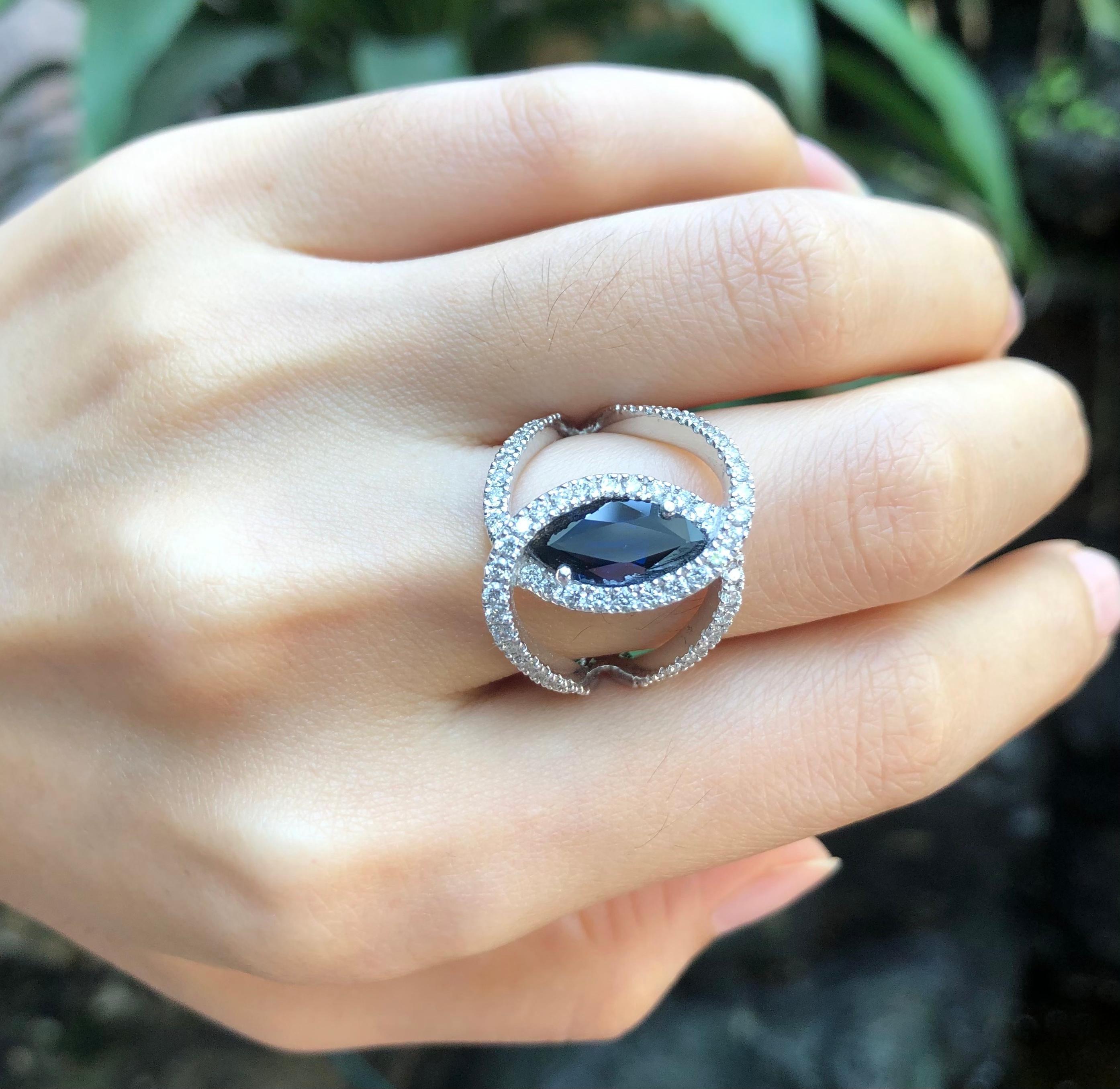 Marquise Cut Blue Sapphire with Diamond Ring Set in 18 Karat White Gold Settings For Sale