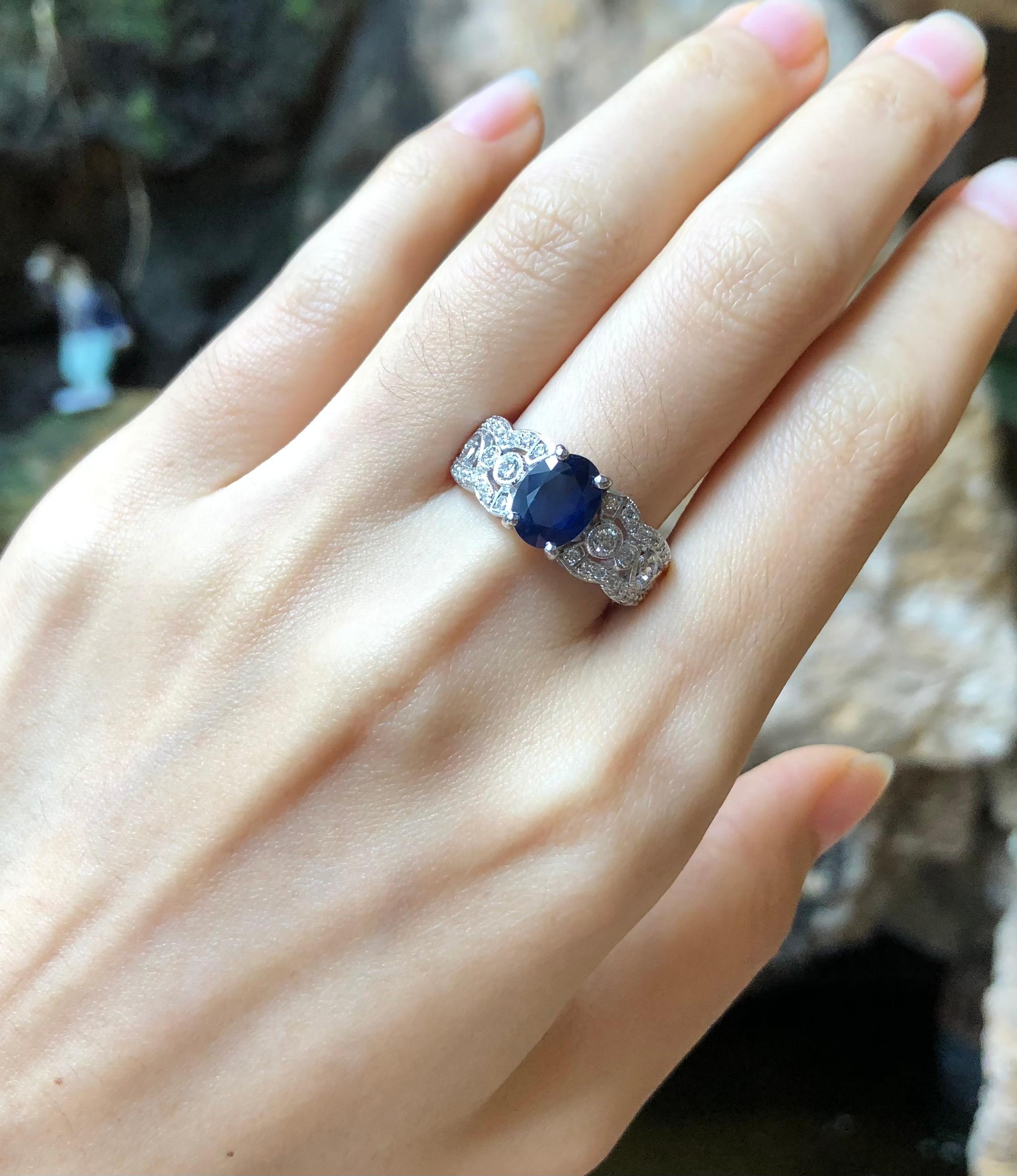 Blue Sapphire with Diamond Ring Set in 18 Karat White Gold Settings For Sale 1