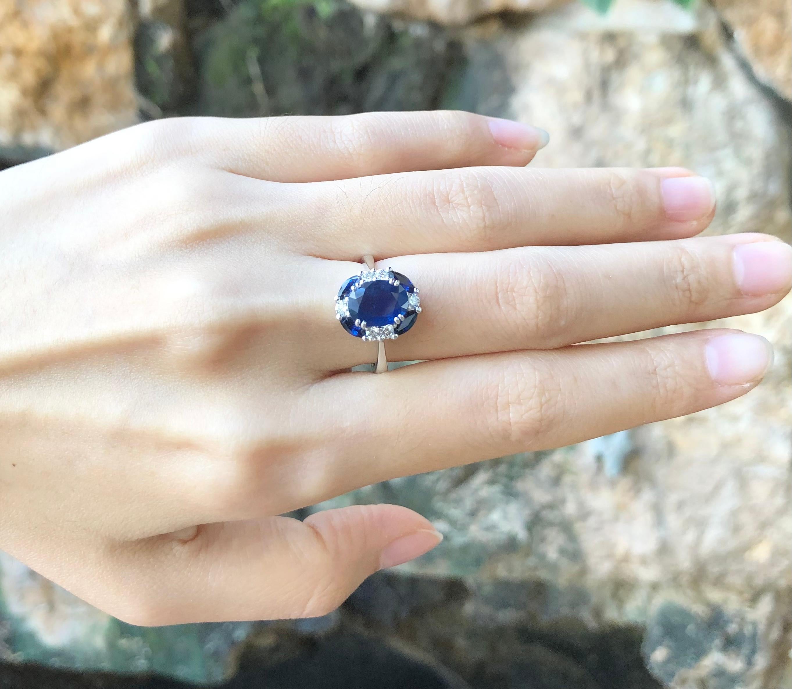 Blue Sapphire with Diamond Ring Set in 18 Karat White Gold Settings For Sale 1