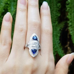 Blue Sapphire with Diamond Ring Set in 18 Karat White Gold Settings