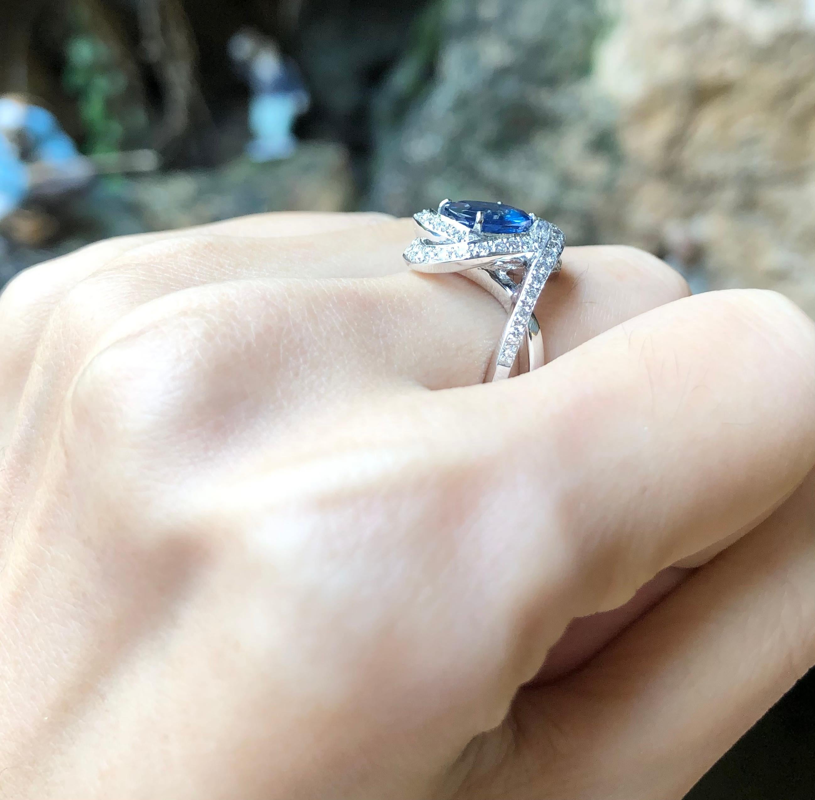 Women's Blue Sapphire with Diamond Ring Set in 18 Karat White Gold Settings For Sale