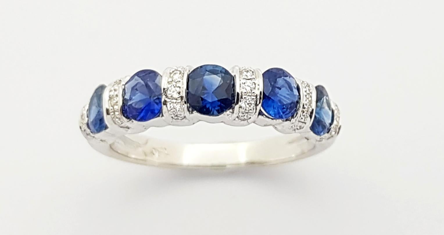 Women's Blue Sapphire with Diamond Ring Set in 18 Karat White Gold Settings For Sale