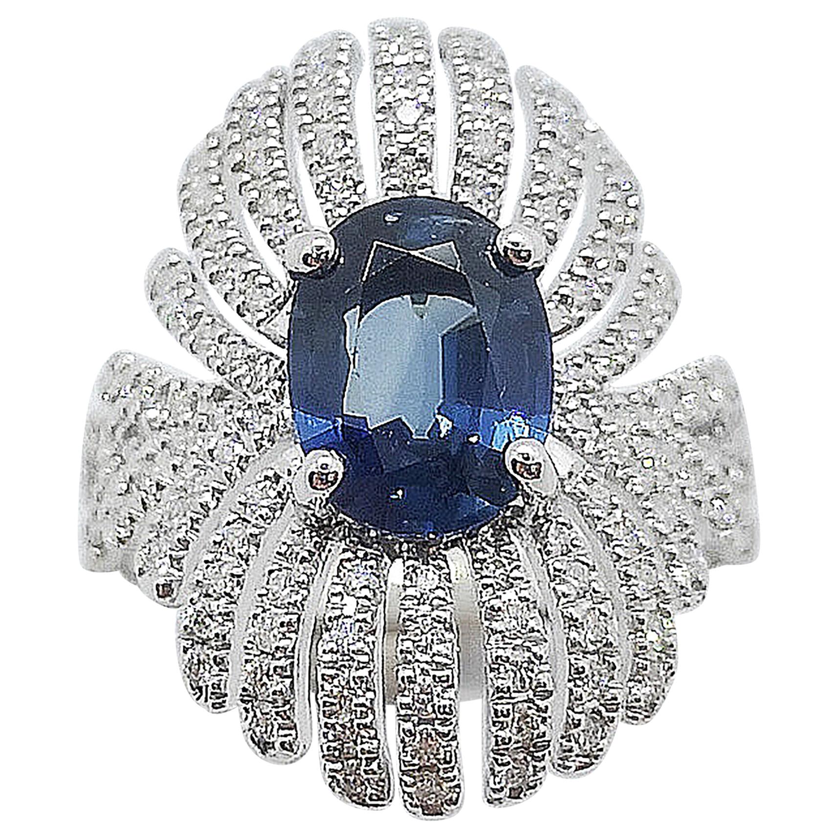 Blue Sapphire with Diamond Ring Set in 18 Karat White Gold Settings For Sale