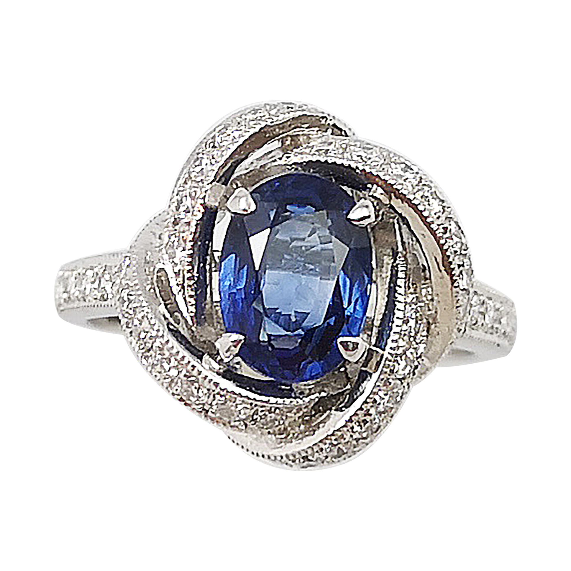 Blue Sapphire with Diamond Ring Set in 18 Karat White Gold Settings For Sale
