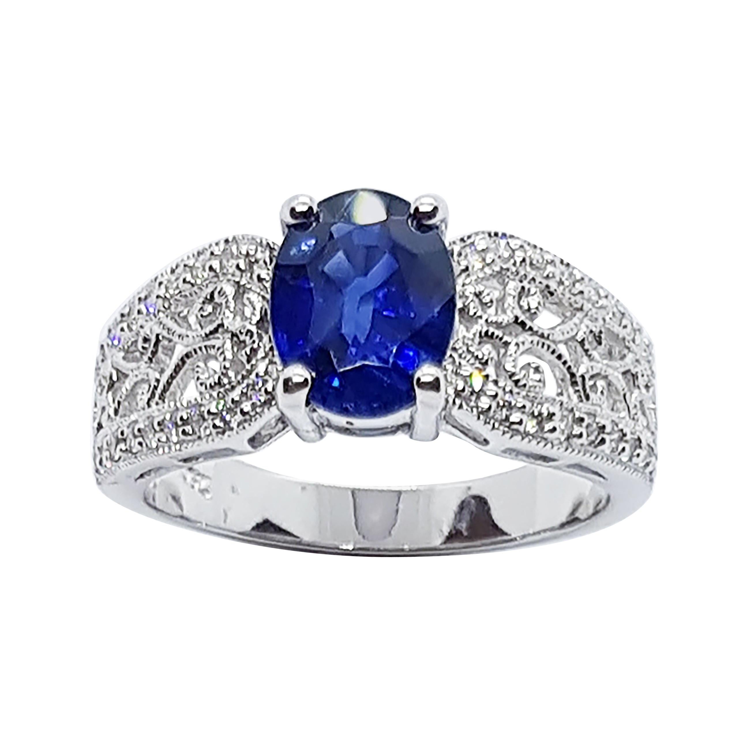 Blue Sapphire with Diamond Ring Set in 18 Karat White Gold Settings For Sale