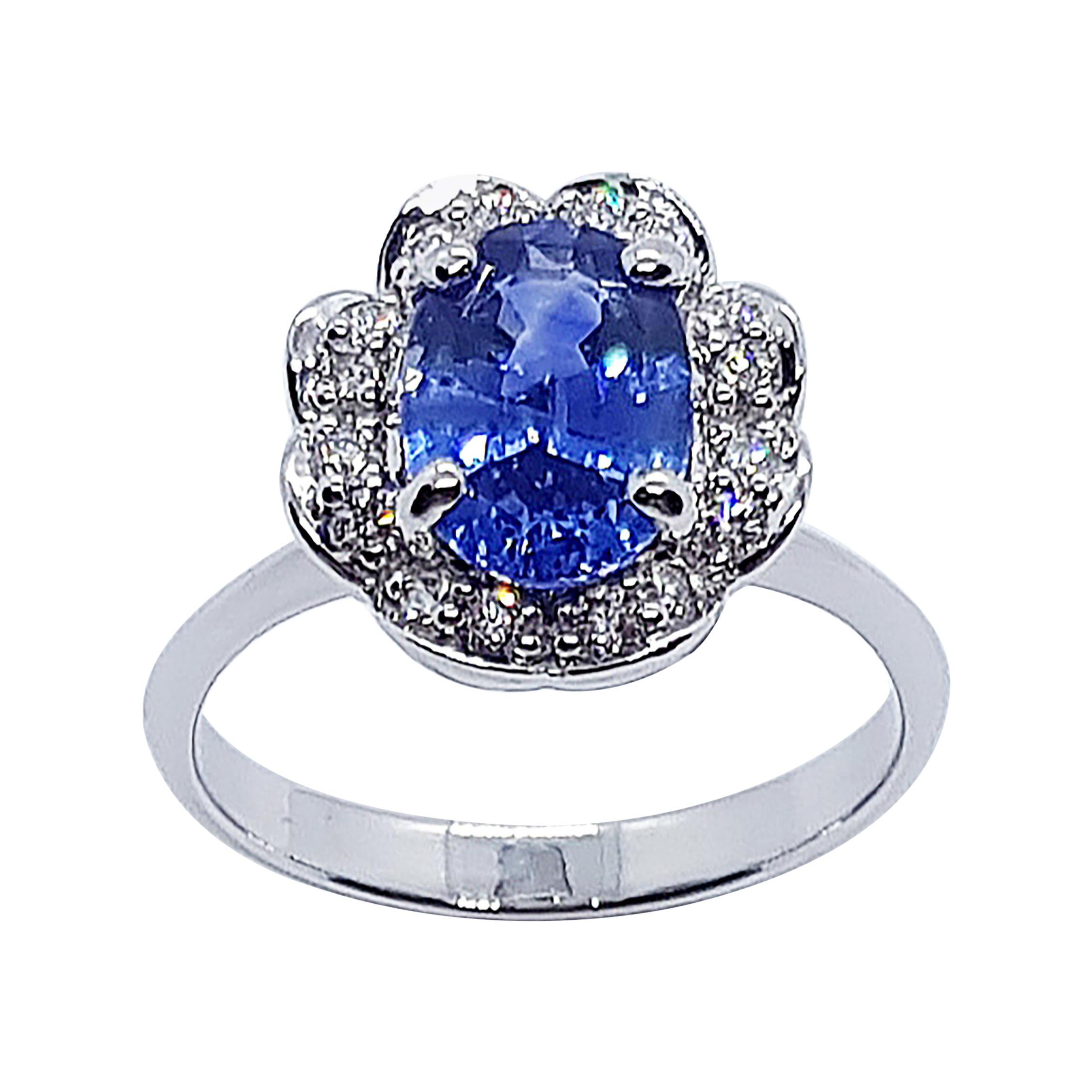 Blue Sapphire with Diamond Ring Set in 18 Karat White Gold Settings