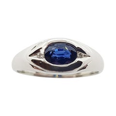 Blue Sapphire with Diamond Ring Set in 18 Karat White Gold Settings