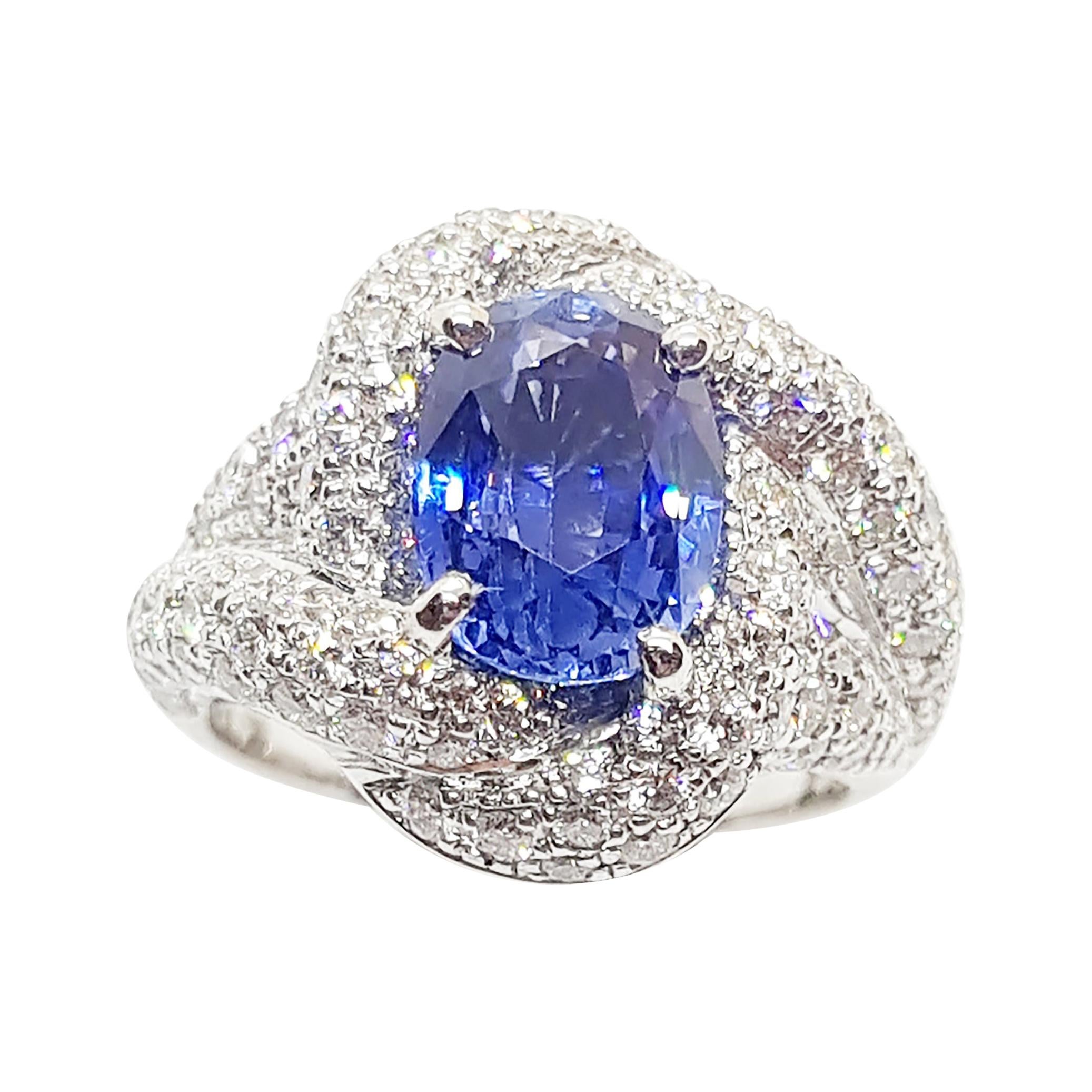 Blue Sapphire with Diamond Ring Set in 18 Karat White Gold Settings