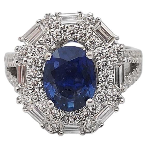 Blue Sapphire with Diamond Ring Set in 18 Karat White Gold Settings