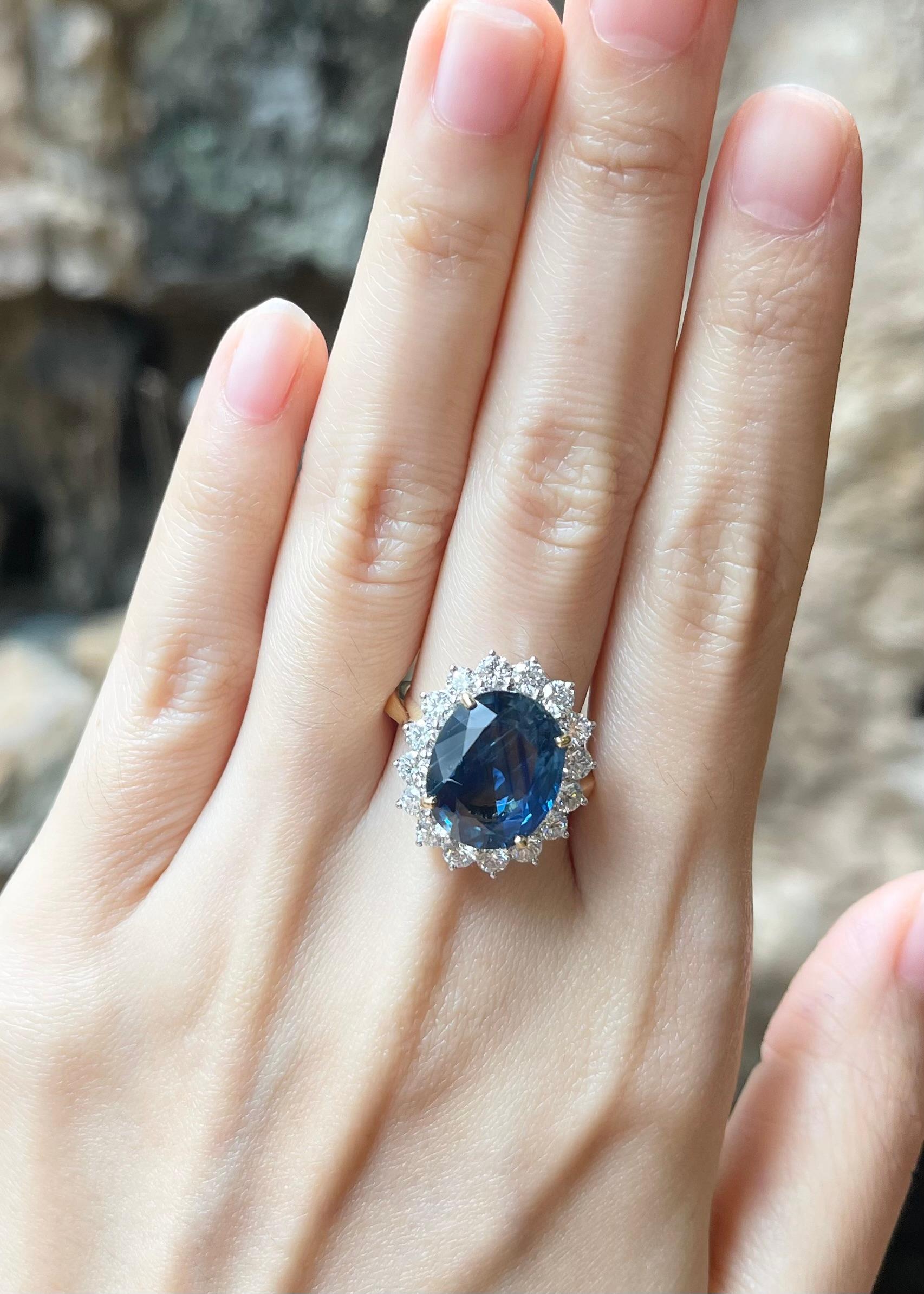 Blue Sapphire 8.81 carats with Diamond 1.44 carats Ring set in 18K Gold Settings

Width:  1.7 cm 
Length: 1.2 cm
Ring Size: 54
Total Weight: 9.46 grams

Blue Sapphire 
Width:  1.1 cm 
Length: 1.4 cm


