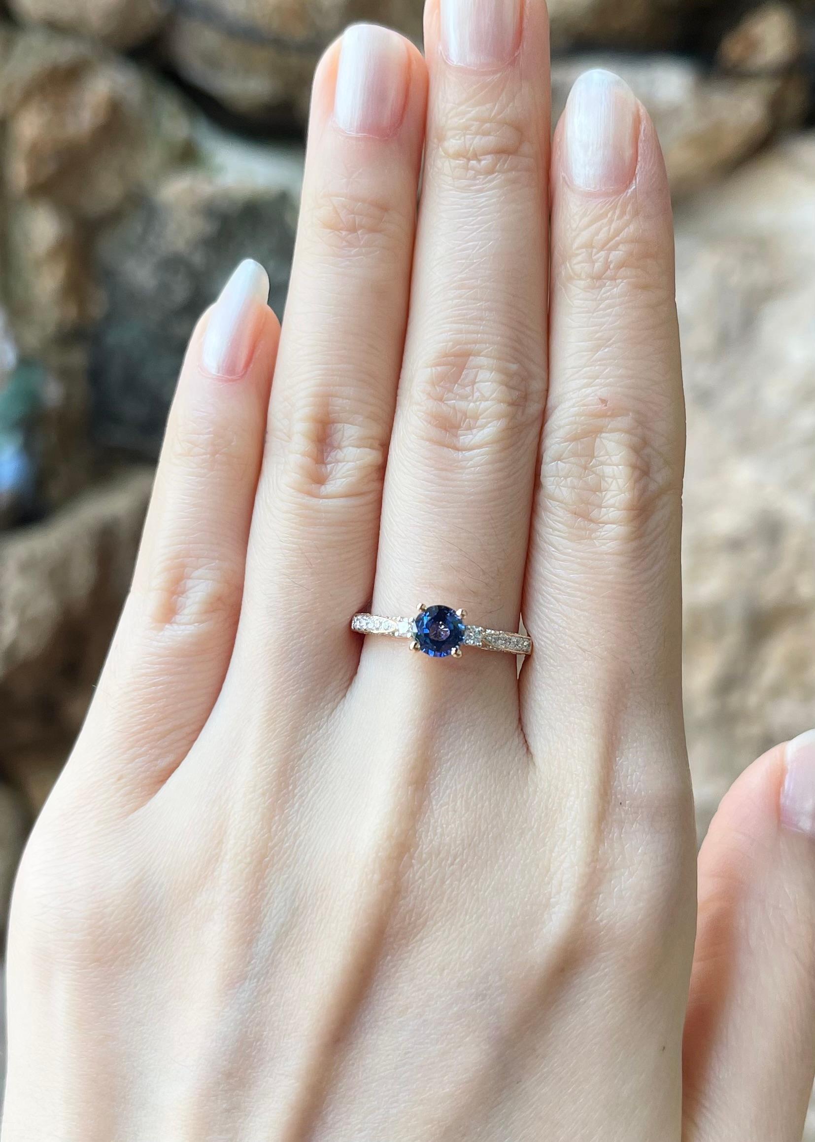 Blue Sapphire 0.70 carat with Diamond 0.34 carat Ring set in 18K Gold Settings

Width:  1.0 cm 
Length: 0.5 cm
Ring Size: 52
Total Weight: 2.70 grams

