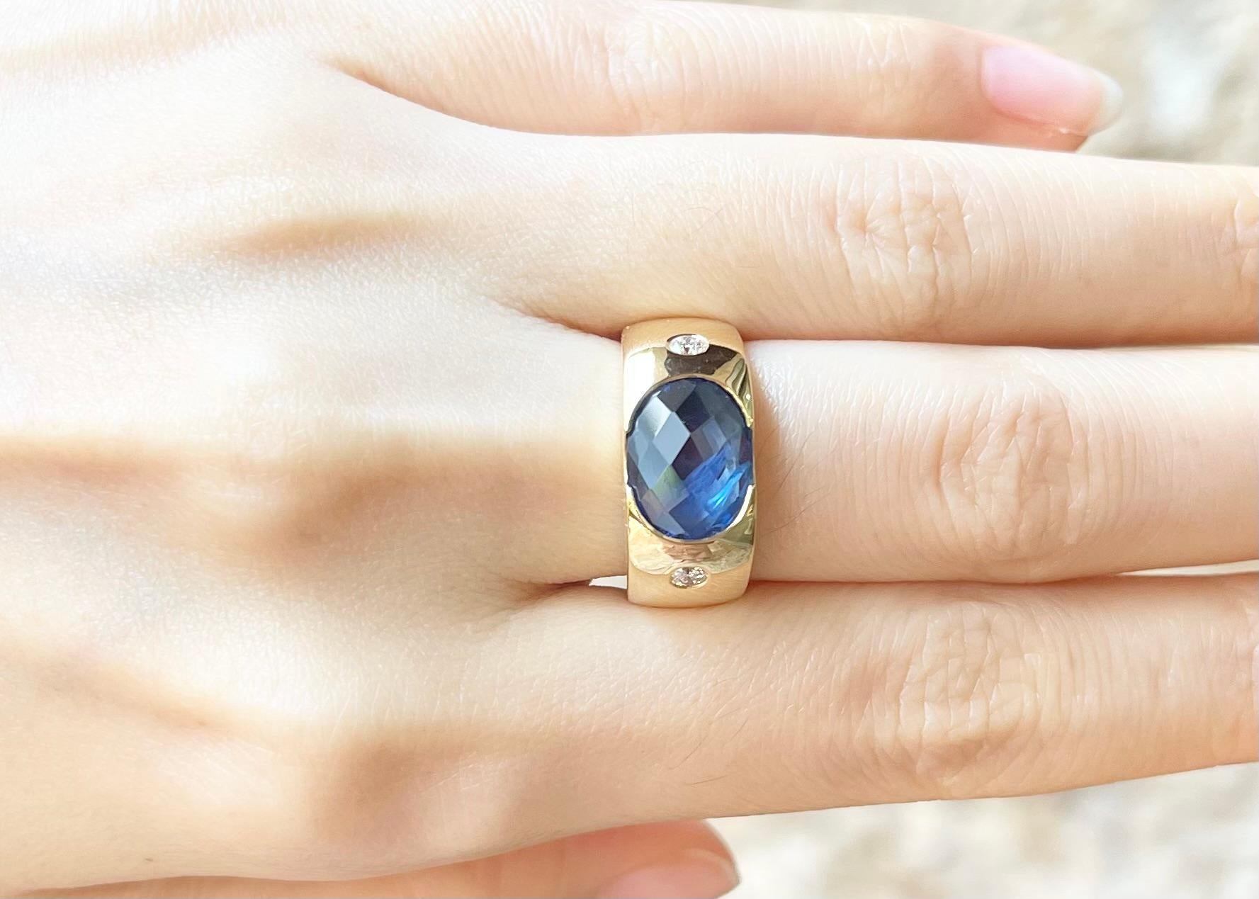 Contemporary Blue Sapphire with Diamond Ring set in 18K Gold Settings For Sale