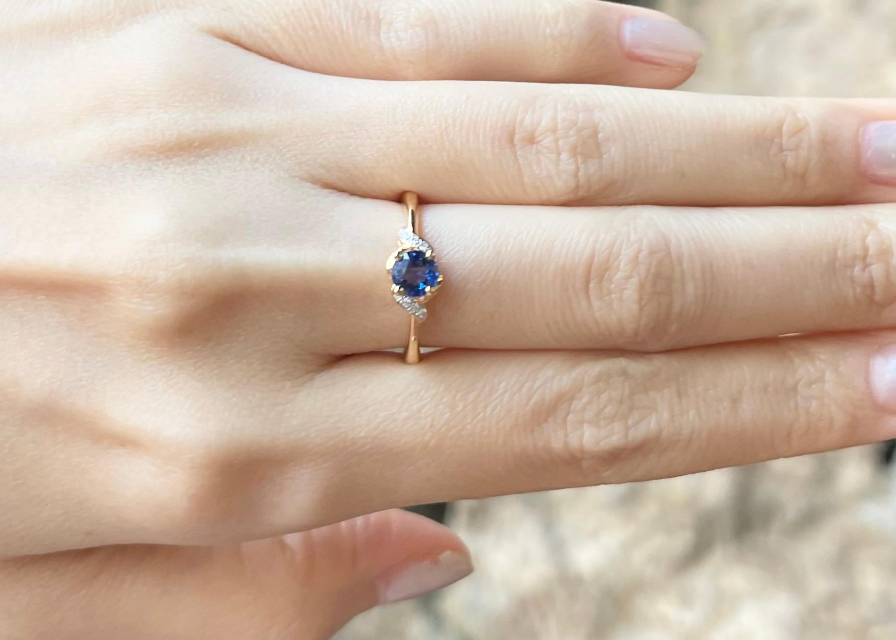 Contemporary Blue Sapphire with Diamond Ring set in 18K Gold Settings For Sale