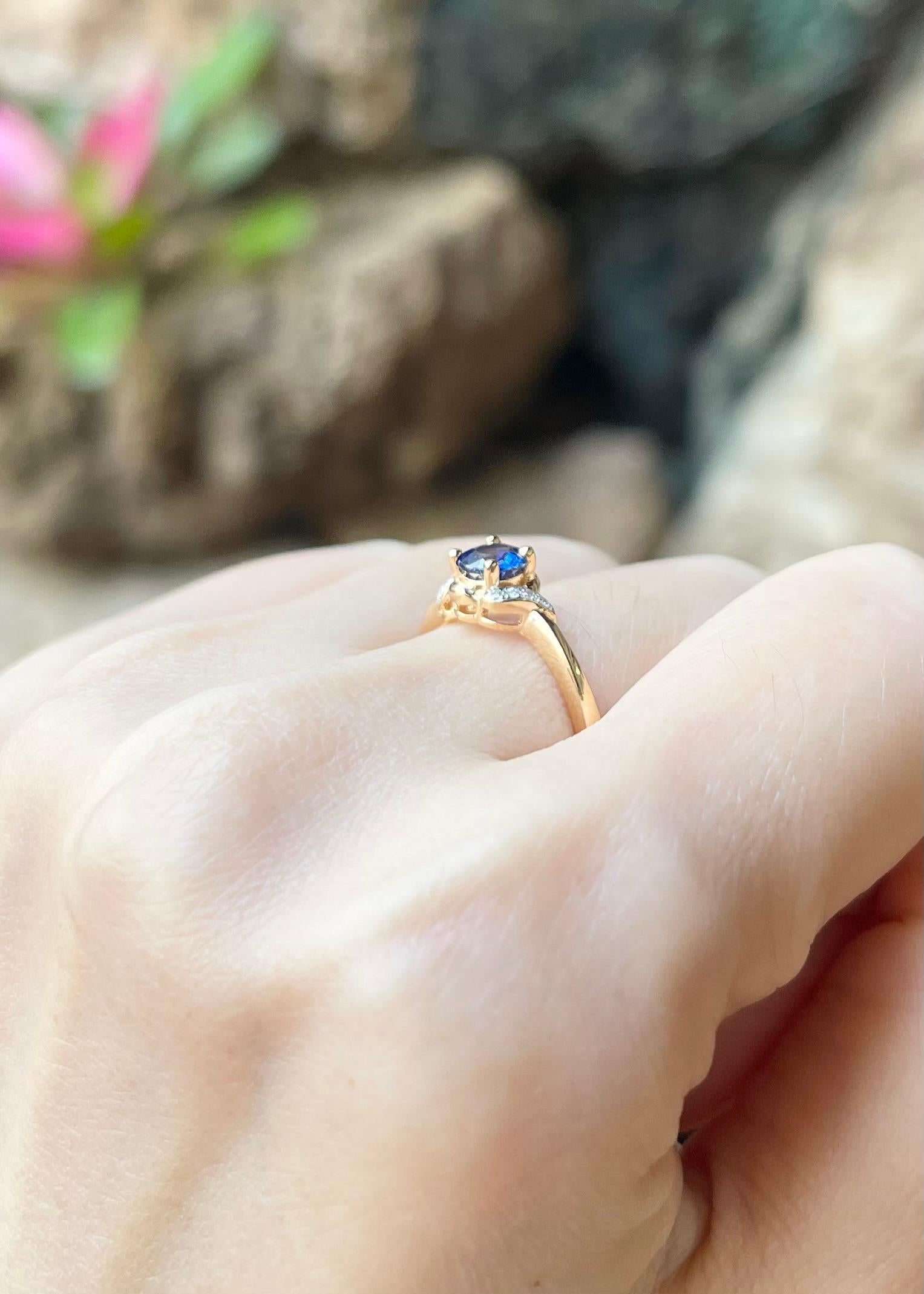 Women's Blue Sapphire with Diamond Ring set in 18K Gold Settings For Sale