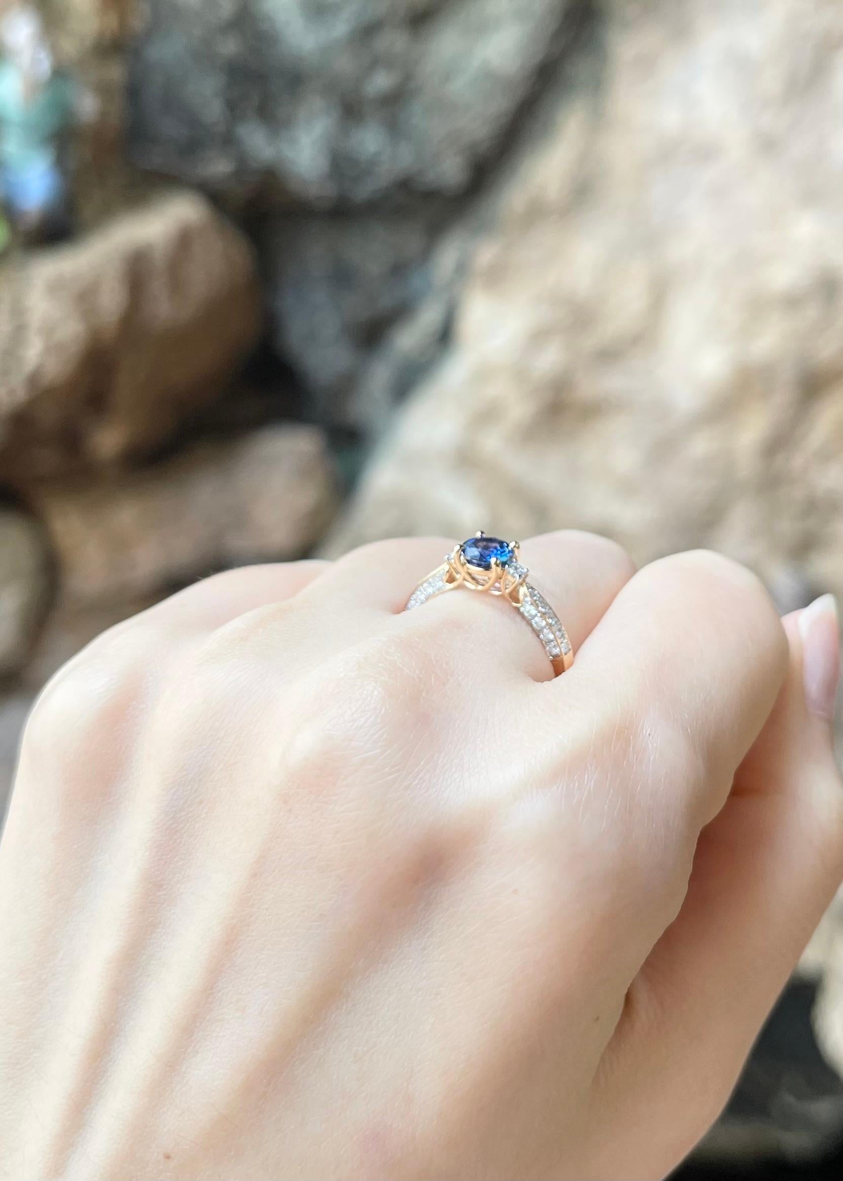 Women's Blue Sapphire with Diamond Ring set in 18K Gold Settings For Sale