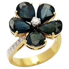 Bague en or 18 carats avec saphir bleu et diamant