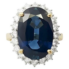 Bague en or 18 carats avec saphir bleu et diamant