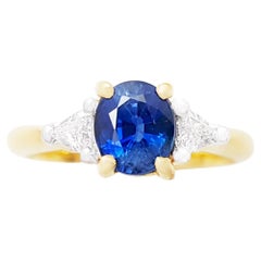 Bague en or 18 carats avec saphir bleu et diamant