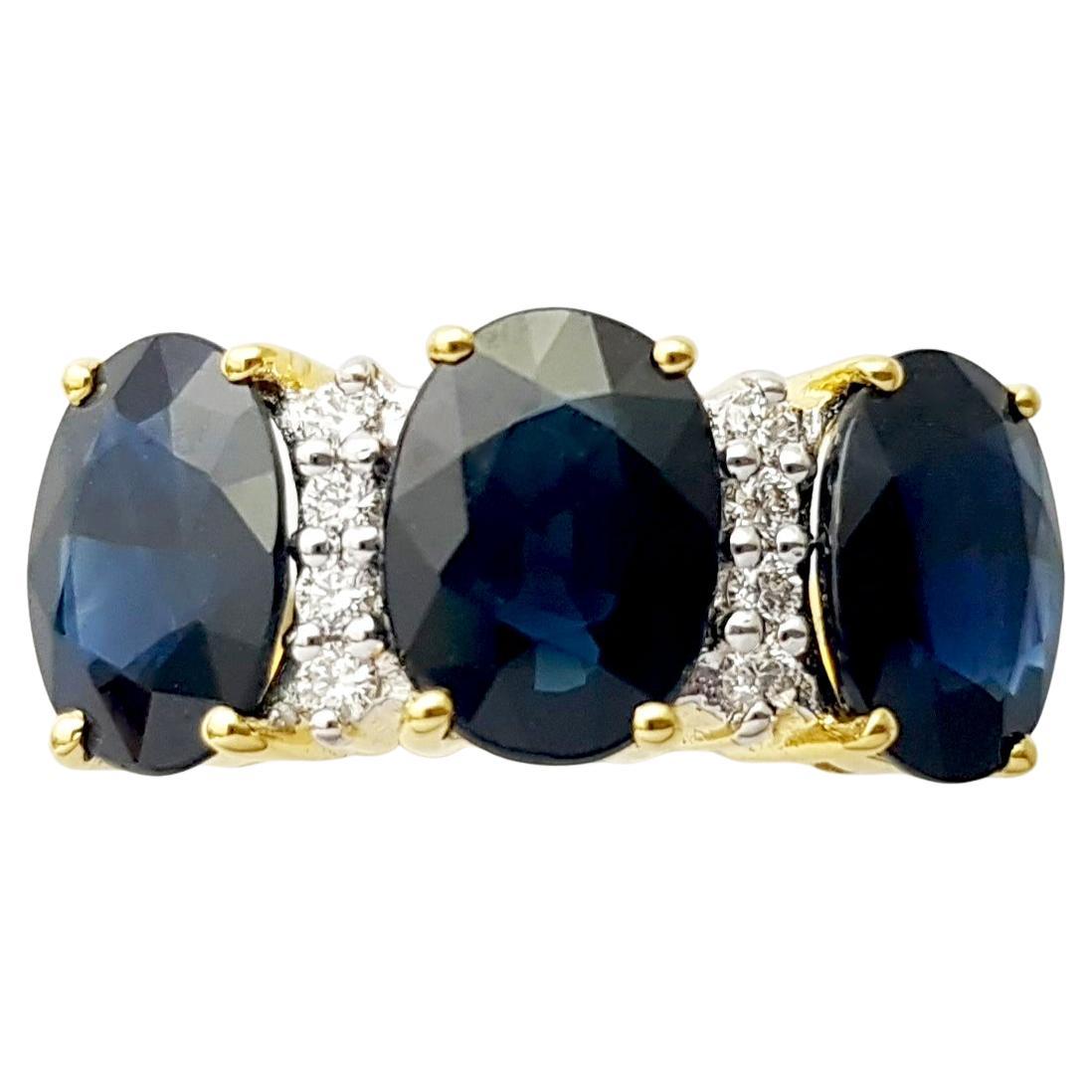 Bague en or 18 carats avec saphir bleu et diamant
