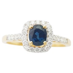 Bague en or 18 carats avec saphir bleu et diamant