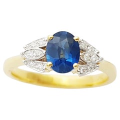 Bague en or 18 carats avec saphir bleu et diamant