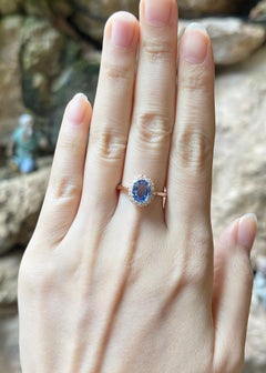 Blue Sapphire with Diamond Ring set in 18K Rose Gold Settings