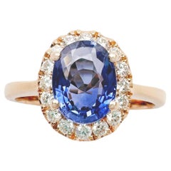 Blue Sapphire with Diamond Ring set in 18K Rose Gold Settings