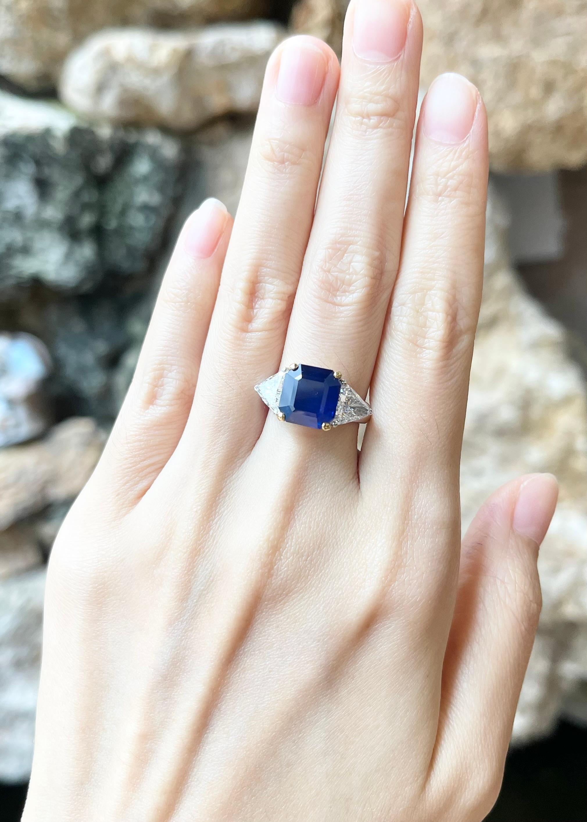 Blue Sapphire 5.20 carats with Diamond (F color) 1.80 carats Ring set in 18K White Gold Settings

Width:  2.1 cm 
Length: 1.0 cm
Ring Size: 51
Total Weight: 7.53 grams

Blue sapphire 
Width:  1.0 cm 
Length: 1.0 cm
