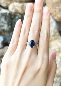 Blue Sapphire with Diamond Ring set in 18K White Gold Settings