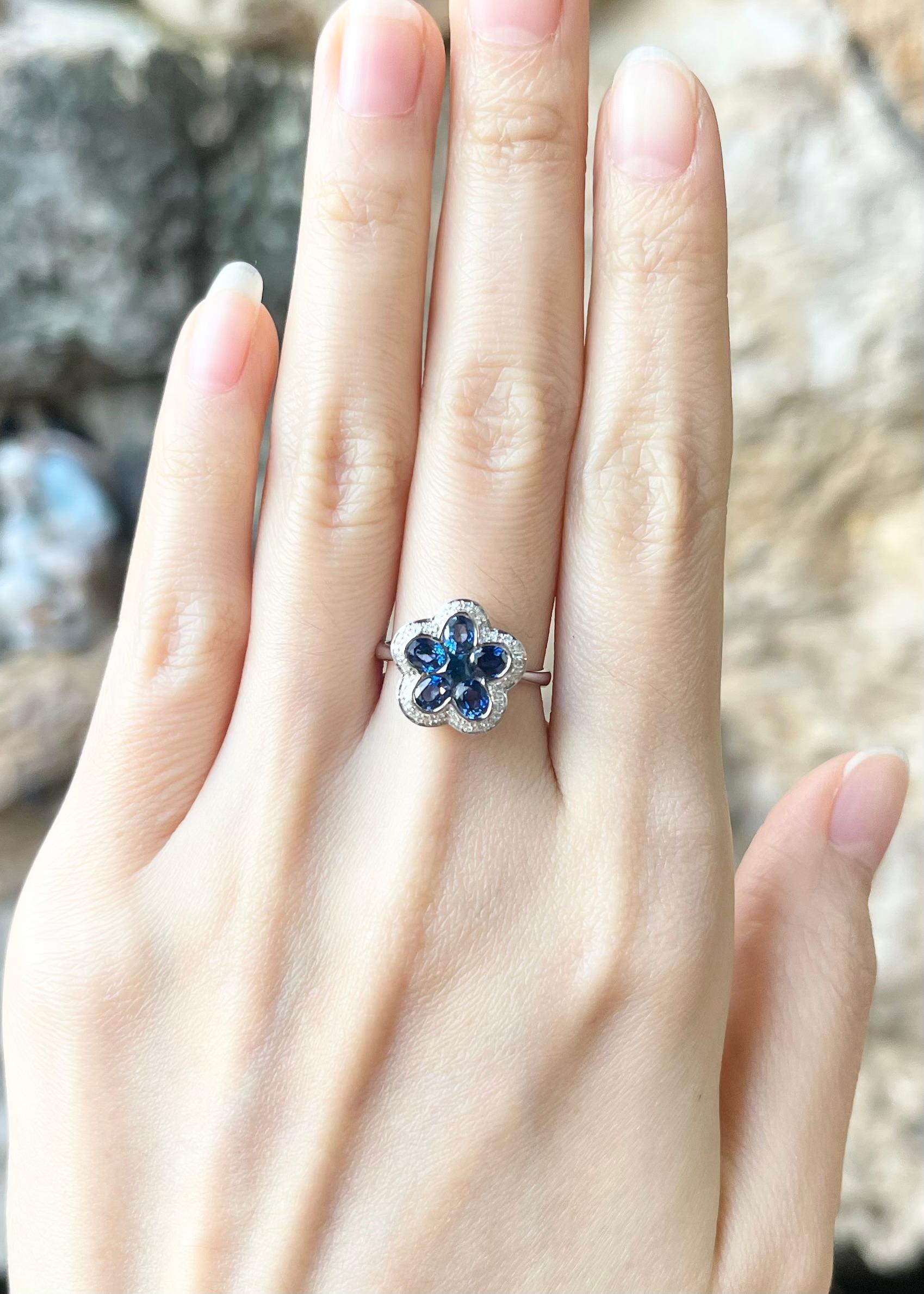 Blue Sapphire 1.45 carats with Diamond 0.12 carats Ring set in 18K White Gold Settings

Width:  1.3 cm 
Length: 1.3 cm
Ring Size: 52
Total Weight: 5.22 grams

