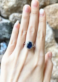 Blue Sapphire with Diamond Ring set in 18K White Gold Settings