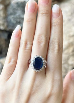 Blue Sapphire with Diamond Ring set in 18K White Gold Settings