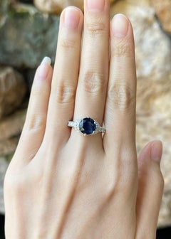Blue Sapphire with Diamond Ring set in 18K White Gold Settings