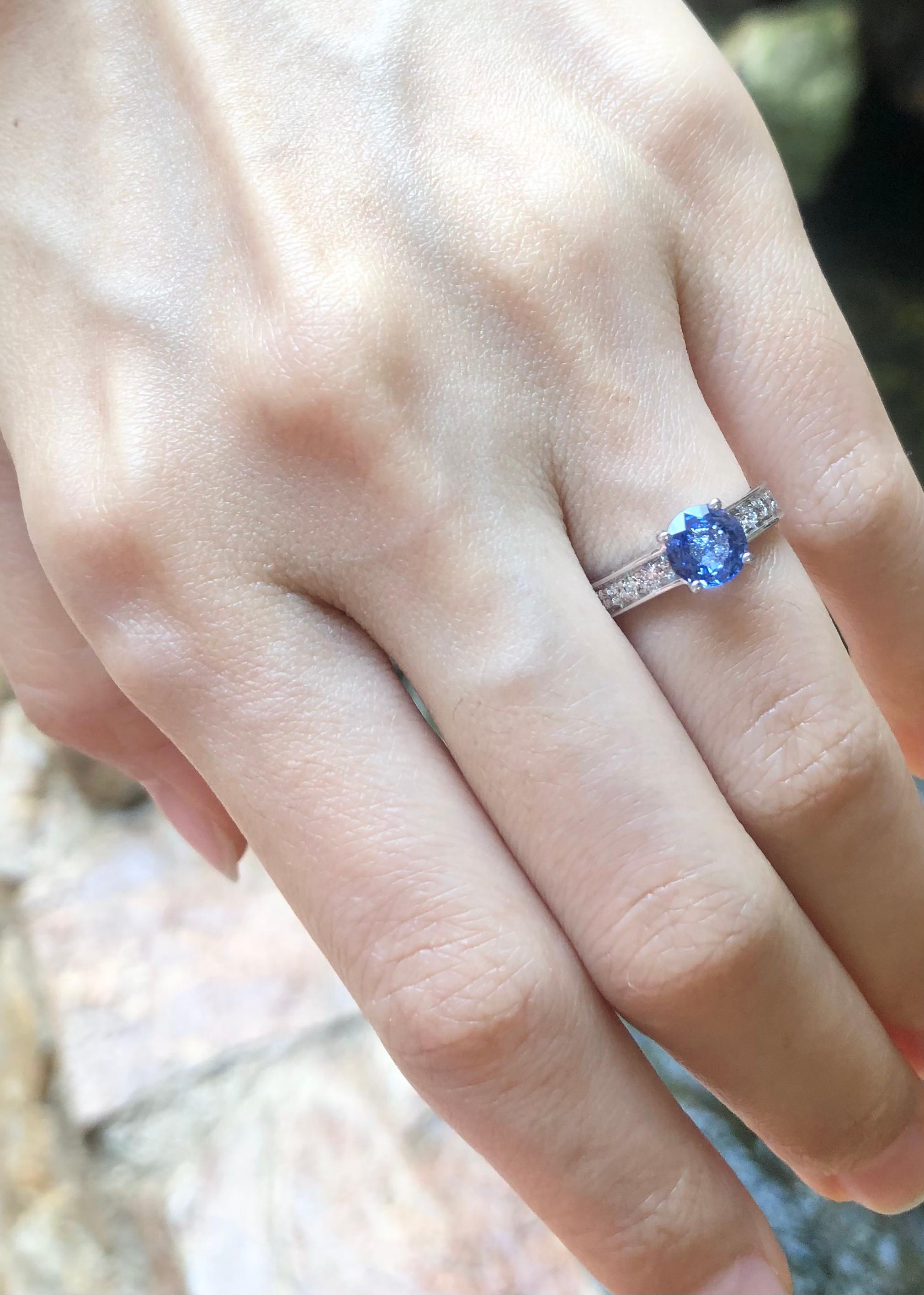 Contemporary Blue Sapphire with Diamond Ring Set in 18k White Gold Settings For Sale